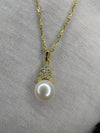 18k Gold Plated Sterling Silver Necklace with Bread Shaped Round Natural Freshwater Pearl Pendant with Criss Cross Moissanite Stones