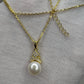 18k Gold Plated Sterling Silver Necklace with Bread Shaped Round Natural Freshwater Pearl Pendant with Criss Cross Moissanite Stones