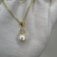 18k Gold Plated Sterling Silver Necklace with Bread Shaped Round Natural Freshwater Pearl Pendant with Criss Cross Moissanite Stones