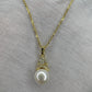 18k Gold Plated Sterling Silver Necklace with Bread Shaped Round Natural Freshwater Pearl Pendant with Criss Cross Moissanite Stones